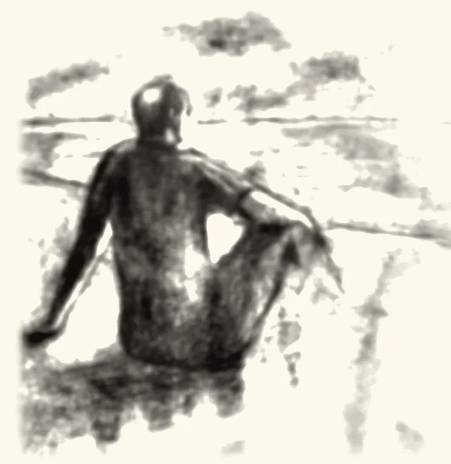 A man sitting alone, looking out over open ground.